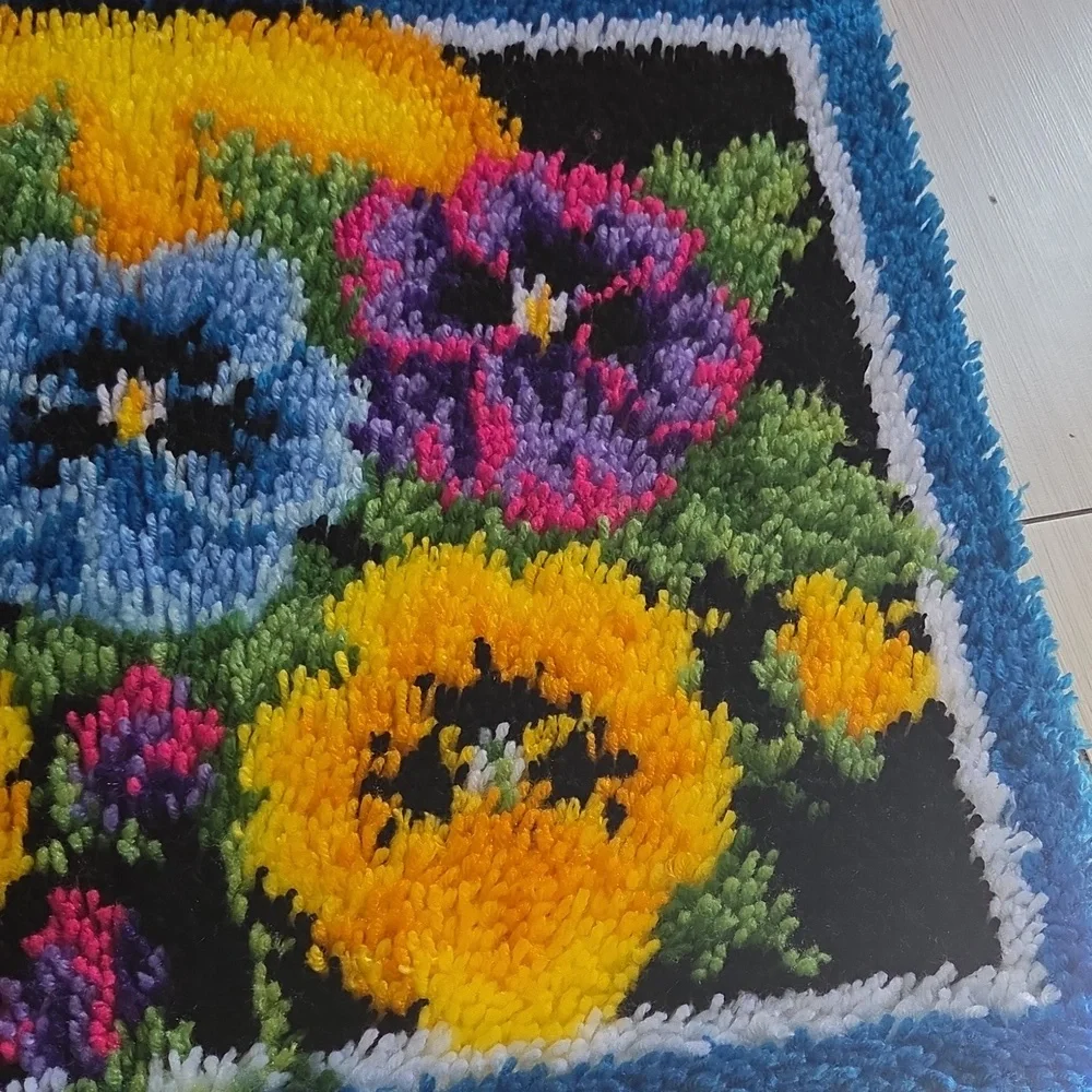 Completed Caron Wonderart Pot of Pansies Rug